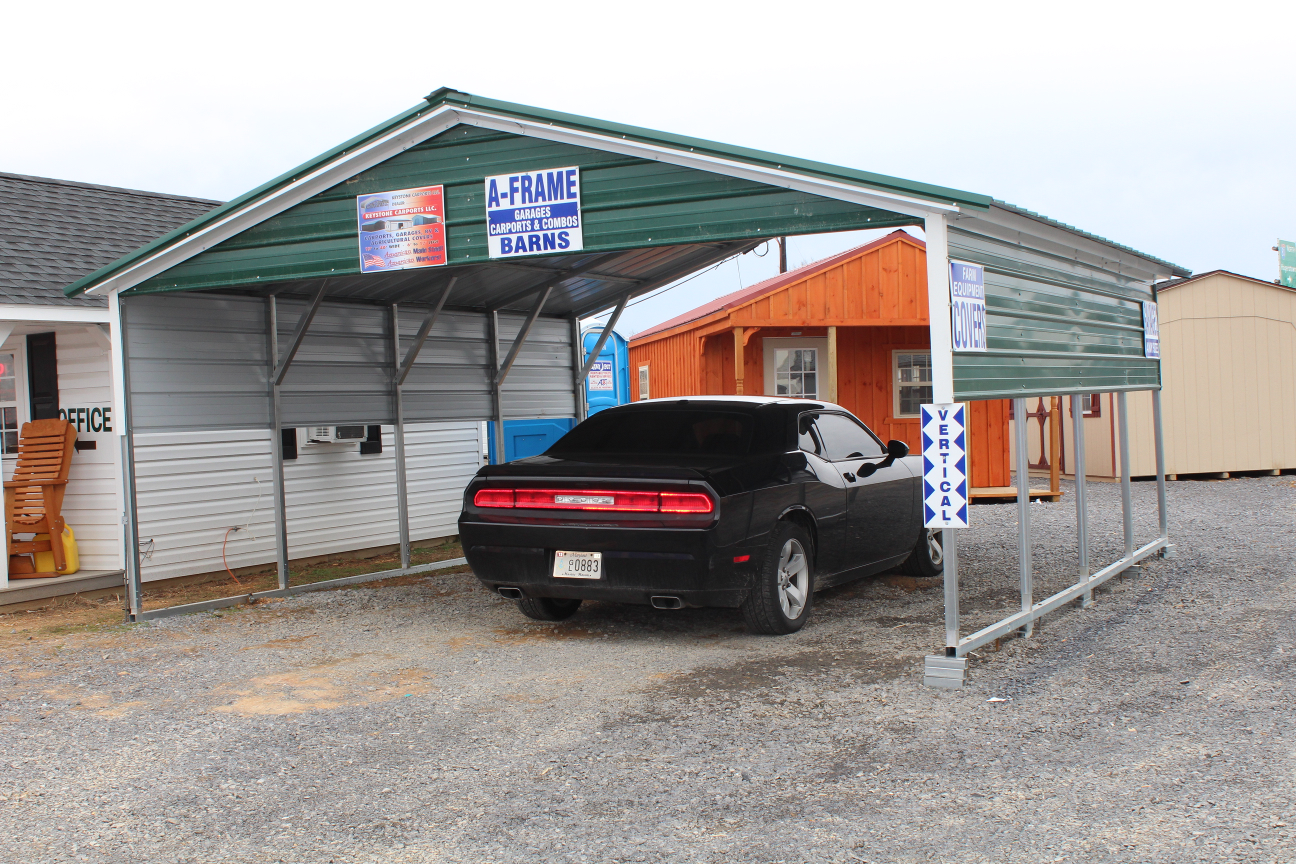 18x21 Carport with Green roof and sides