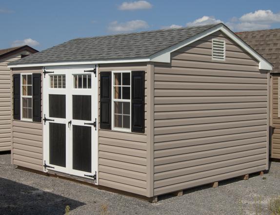 10x14 Peak Style Portable Storage Shed with Pebble Clay Vinyl Siding, Black Wood Doors, and Shelves Built Inside