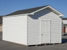 Custom Front Entry Peak Shed with White Vinyl Siding from Pine Creek Structures