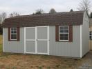 Pine Creek 12x20 HD Dutch Barn with Light Gray walls, White trim and Chestnut shutters, and Barkwood shingles